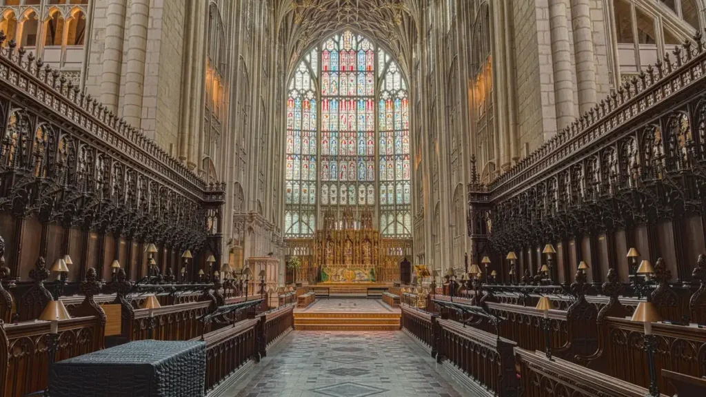 The quire and great east window inside Gloucester Cathedral, a highlight of a weekend break in Gloucester